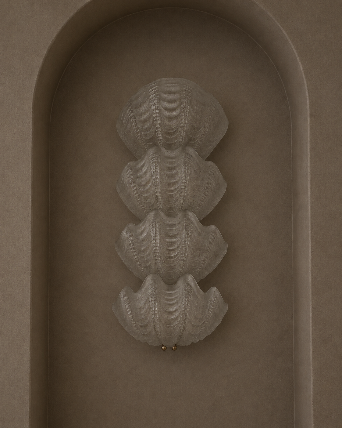 A sculptural wall sconce featuring four stacked, textured clam-shell forms in a warm taupe finish, mounted on a matching arched plaster wall.