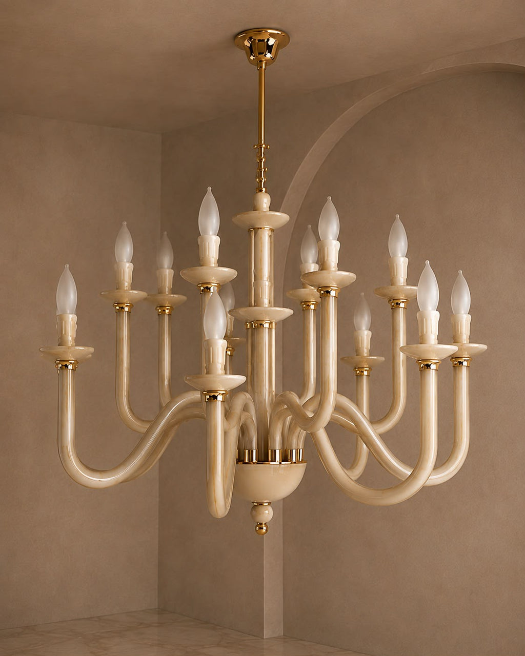 A multi-arm chandelier with curved cream-colored arms and gold-toned hardware, suspended from a matching ceiling canopy in a warm beige interior room.